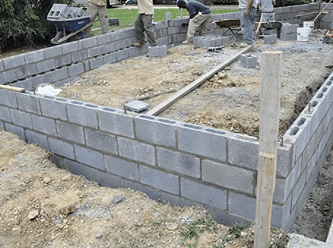 Professionals building a foundation with blocks in Anaheim, CA