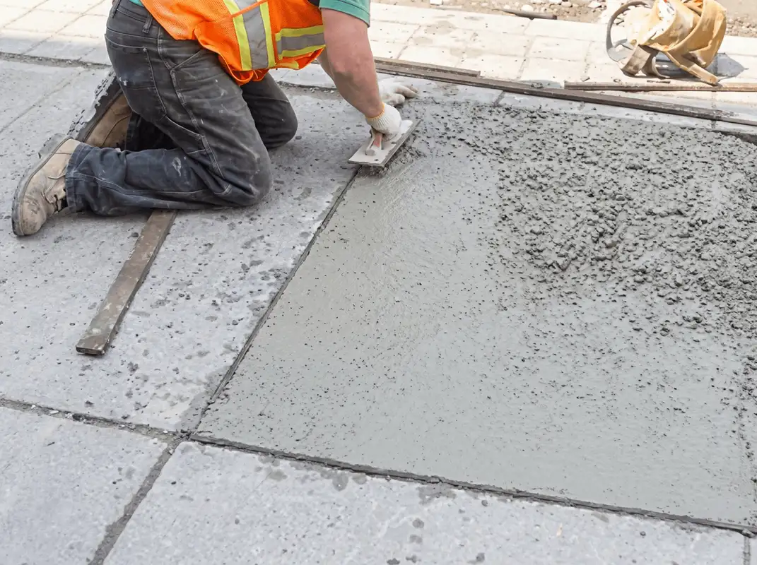 Professional repairing a concrete floor in Anaheim, CA
