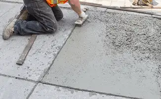 Professional repairing a concrete floor in Anaheim, CA